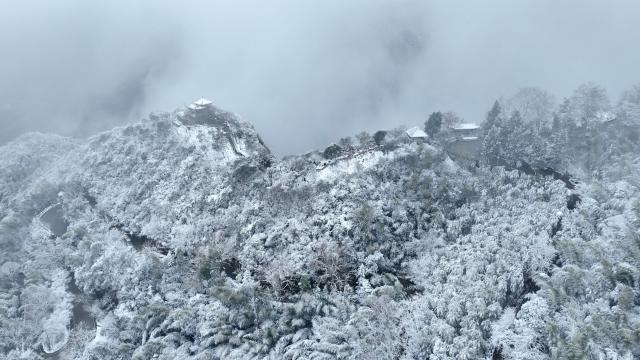(260102) -- BEIJING, Jan. 2, 2026 (Xinhua) -- An aerial drone photo taken on Jan. 1, 2026 shows a view of the Mogan Mountain after a snowfall in Deqing County, east China's Zhejiang Province. Snowfall hit many parts of China during the New Year's Day holiday, drawing tourists to enjoy the snowy scenery. (Photo by Xie Shangguo/Xinhua)