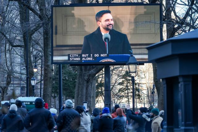 (260103) -- BEIJING, Jan. 3, 2026 (Xinhua) -- This photo shows a screen displaying Zohran Mamdani speaking during his inauguration ceremony in New York City, the United States, Jan. 1, 2026. Democrat Zohran Mamdani was sworn in as New York City mayor on Thursday, becoming the first Muslim leader of America's largest city by population with a vow to combat the city's affordability crisis. (Photo by Zack Zhang/Xinhua)