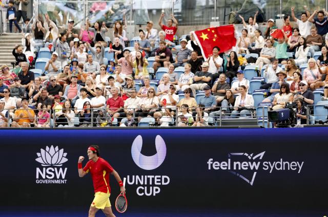 (260103) -- SYNDEY, Jan. 3, 2026 (Xinhua) -- Zhang Zhizhen of China celebrates during the men's singles match against Zizou Bergs of Belgium in the Group B round robin match between China and Belgium at the 2026 United Cup tennis tournament in Sydney, Australia, Jan. 3, 2026. (Xinhua/Ma Ping)