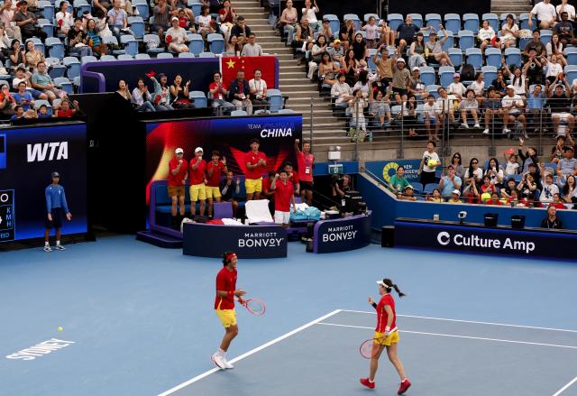 (260103) -- SYNDEY, Jan. 3, 2026 (Xinhua) -- Zhu Lin (R)/Zhang Zhizhen of China celebrate during the mixed doubles match against Elise Mertens/Zizou Bergs of Belgium in the Group B round robin match between China and Belgium at the 2026 United Cup tennis tournament in Sydney, Australia, Jan. 3, 2026. (Xinhua/Ma Ping)