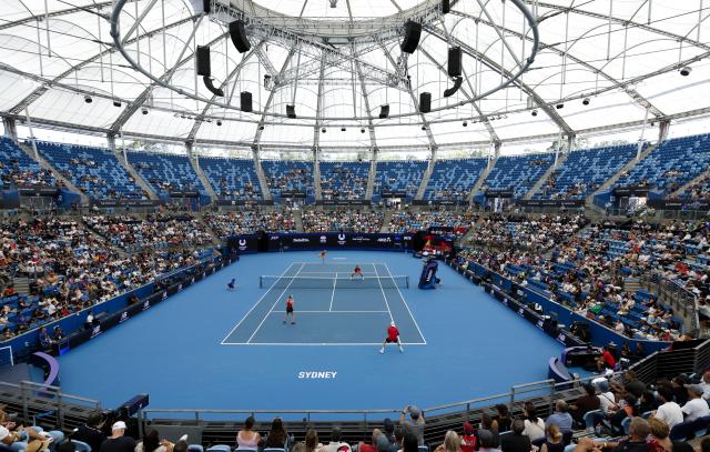 (260103) -- SYNDEY, Jan. 3, 2026 (Xinhua) -- Zhu Lin (2nd L)/Zhang Zhizhen (2nd R) of China and Elise Mertens (1st L)/Zizou Bergs (1st R) of Belgium compete during the mixed doubles match against Elise Mertens/Zizou Bergs of Belgium in the Group B round robin match between China and Belgium at the 2026 United Cup tennis tournament in Sydney, Australia, Jan. 3, 2026. (Xinhua/Ma Ping)