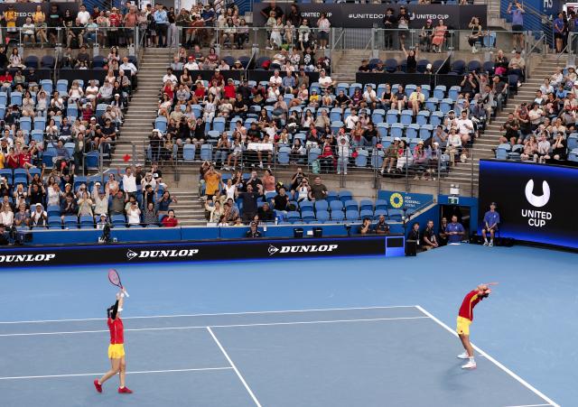 (260103) -- SYNDEY, Jan. 3, 2026 (Xinhua) -- Zhu Lin (L)/Zhang Zhizhen of China celebrate after the mixed doubles match against Elise Mertens/Zizou Bergs of Belgium in the Group B round robin match between China and Belgium at the 2026 United Cup tennis tournament in Sydney, Australia, Jan. 3, 2026. (Xinhua/Ma Ping)