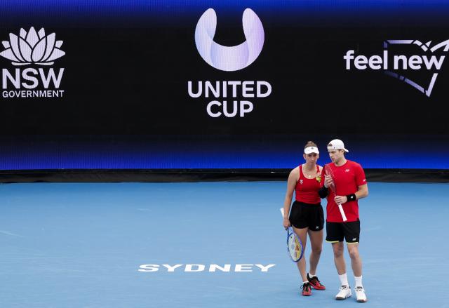(260103) -- SYNDEY, Jan. 3, 2026 (Xinhua) -- Elise Mertens (L)/Zizou Bergs of Belgium react during the mixed doubles match against Zhu Lin /Zhang Zhizhen of China in the Group B round robin match between China and Belgium at the 2026 United Cup tennis tournament in Sydney, Australia, Jan. 3, 2026. (Xinhua/Ma Ping)