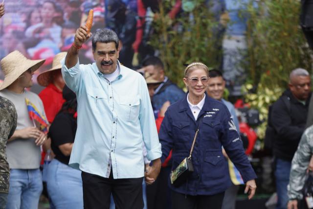 (260103) -- CARACAS, Jan. 3, 2026 (Xinhua) -- This file photo shows Venezuelan President Nicolas Maduro and his wife attending an event in Caracas, capital of Venezuela, Dec. 10, 2025. The U.S. military launched a series of attacks against Venezuela early Saturday morning, reportedly capturing President Nicolas Maduro and flying him out of the country.
  Venezuela's Vice President Delcy Rodriguez, speaking on a state-run television station, said the whereabouts of Maduro and his wife are unknown, asking for proof they are alive. (Xinhua)