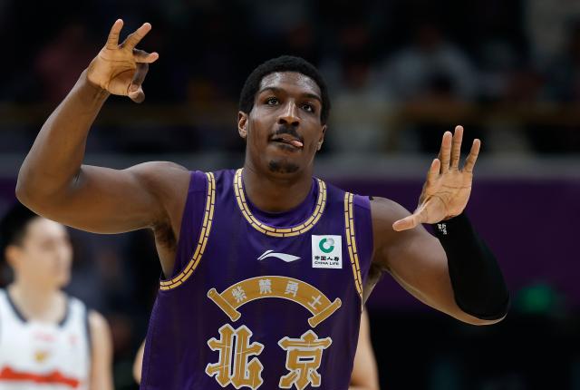 (260103) -- BEIJING, Jan. 3, 2026 (Xinhua) -- Reginald Perry of Beijing Royal Fighters celebrates scoring a 3-point basket during the 10th round regular season match between Beijing Royal Fighters and Guangdong Southern Tigers at the 2025-2026 Chinese Basketball Association (CBA) league in Beijing, China, Jan. 3, 2026. (Xinhua/Wang Lili)
