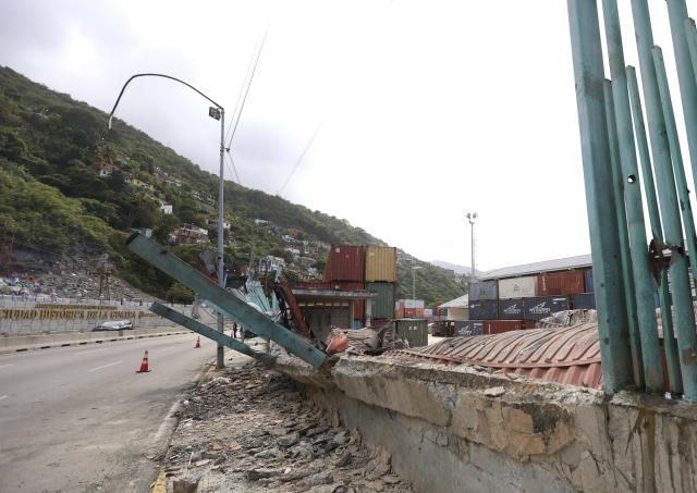 (260104) -- LA GUAIRA, Jan. 4, 2026 (Xinhua) -- This photo taken on Jan. 3, 2026 shows damage caused by an airstrike at the port of La Guaira, Venezuela. The U.S. military launched a series of attacks against Venezuela early Saturday morning, reportedly capturing Venezuelan President Nicolas Maduro and flying him out of the country. (Str/Xinhua)