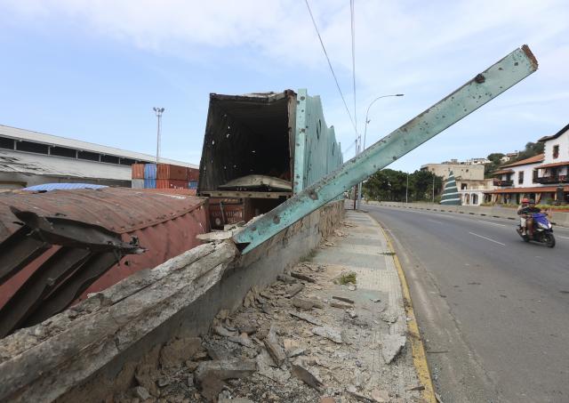 (260104) -- LA GUAIRA, Jan. 4, 2026 (Xinhua) -- This photo taken on Jan. 3, 2026 shows damage caused by an airstrike at the port of La Guaira, Venezuela. The U.S. military launched a series of attacks against Venezuela early Saturday morning, reportedly capturing Venezuelan President Nicolas Maduro and flying him out of the country. (Str/Xinhua)