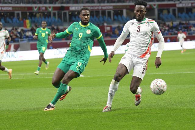 (260104) -- TANGIERS, Jan. 4, 2026 (Xinhua) -- Sudan's Mohamed Saeed Ahmed (R) contests the ball with Senegal's Boulaye Dia during round of 16 football match between Senegal and Sudan at the CAF Africa Cup of Nations 2025 in Tangiers, Morocco, Jan. 3, 2026. (Photo by Aissa/Xinhua)