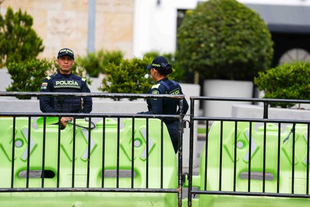 (260104) -- BOGOTA, Jan. 4, 2026 (Xinhua) -- Colombian police officers stand guard outside the U.S. Embassy in Bogota, Colombia, Jan. 3, 2026. (Photo by Andres Moreno/Xinhua)