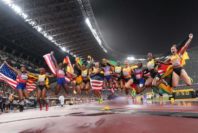 (260104) -- BEIJING, Jan. 4, 2025 (Xinhua) -- Medalists celebrate after the women's 4x100m relay final at the 2025 World Athletics Championships in Tokyo, Japan, Sept. 21, 2025. (Xinhua/Ju Huanzong)