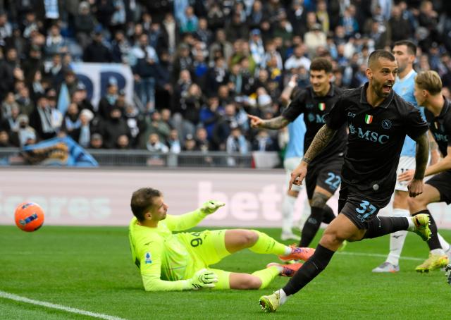(260104) -- ROME, Jan. 4, 2026 (Xinhua) -- Napoli's Leonardo Spinazzola (front) celebrates  his goal during a Serie A football match between Lazio and Napoli in Rome, Italy, Jan. 4, 2026. (Photo by Augusto Casasoli/Xinhua)