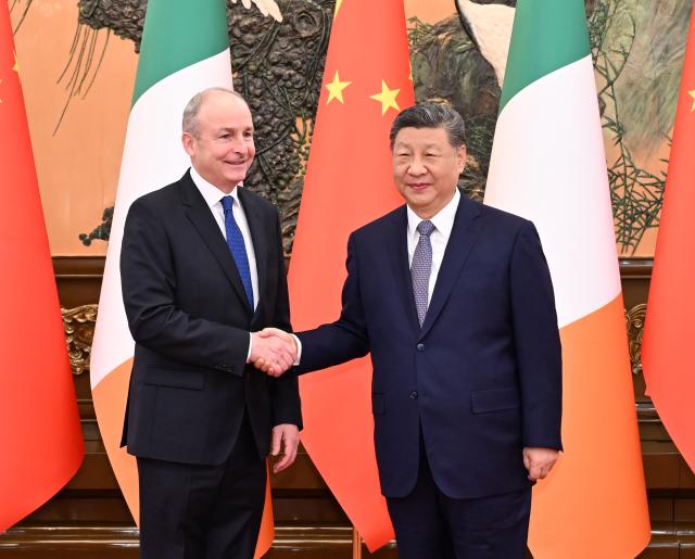 (260105) -- BEIJING, Jan. 5, 2026 (Xinhua) -- Chinese President Xi Jinping meets with Taoiseach of Ireland Micheal Martin at the Great Hall of the People in Beijing, capital of China, Jan. 5, 2026. (Xinhua/Li Xiang)