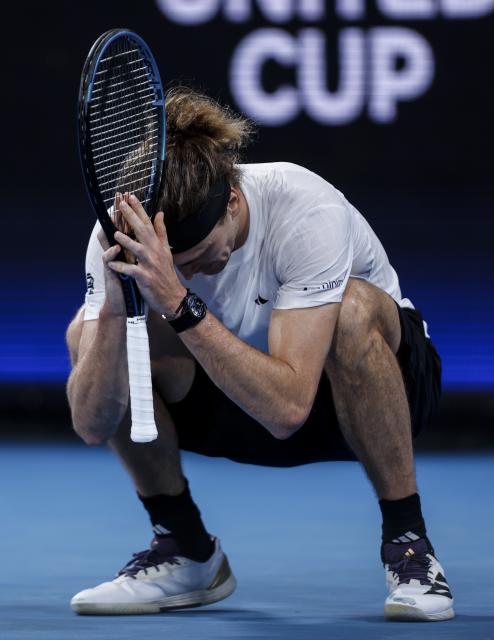(260105) -- SYDNEY, Jan. 5, 2026 (Xinhua) -- Alexander Zverev of Germany reacts during the men's singles match against Hubert Hurkacz of Poland in the Group F round robin match between Poland and Germany at the 2026 United Cup tennis tournament in Sydney, Australia, Jan. 5, 2026. (Xinhua/Ma Ping)