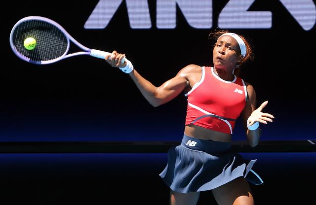 (260105) -- PERTH, Jan. 5, 2026 (Xinhua) -- Coco Gauff of the United States hits a return during the women's singles match against Jessica Bouzas Maneiro of Spain in the Group A round robin match between USA and Spain at the 2026 United Cup tennis tournament in Perth, Australia, Jan. 5, 2026. (Photo by Zhou Dan/Xinhua)