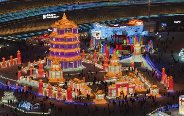 (260105) -- HARBIN, Jan. 5, 2026 (Xinhua) -- An aerial drone photo taken on Jan. 5, 2026 shows a view of the Harbin Ice-Snow World in Harbin, northeast China's Heilongjiang Province. The 42nd Harbin International Ice and Snow Festival kicked off at the Harbin Ice-Snow World here on Monday. (Xinhua/Wang Song)