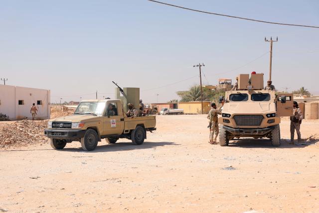 (260105) -- MUKALLA, Jan. 5, 2026 (Xinhua) -- The Saudi-backed forces guard the Riyan Airport after Southern Transitional Council fighters withdrew in Mukalla, capital of Hadramout province, Yemen, Jan. 5, 2026. Yemen's internationally recognized government said on Saturday its forces had regained full control of the oil-rich southeastern province of Hadramout after a Saudi-backed military operation forced out fighters loyal to the Southern Transitional Council (STC). (Str/Xinhua)