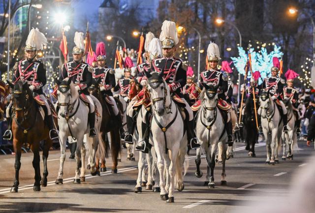 (260106) -- MADRID, Jan. 6, 2026 (Xinhua) -- Uniformed riders take part in a parade celebrating Three Kings Day in Madrid, Spain, on Jan. 5, 2026.
  A grand Three Kings Day float parade was held in Madrid on Monday, drawing thousands of people to watch. (Xinhua/Cheng Min)