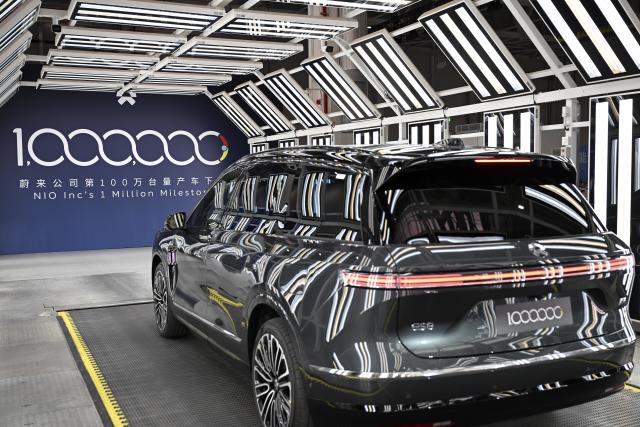 (260106) -- HEFEI, Jan. 6, 2026 (Xinhua) -- This photo taken on Jan. 6, 2026 shows NIO's 1 millionth vehicle at the NIO Second Advanced Manufacturing Base in Hefei, east China's Anhui Province. Chinese electric carmaker NIO saw its 1 millionth vehicle roll off the production line in Hefei on Tuesday. (Xinhua/Huang Bohan)