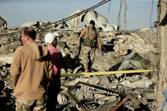 (260106) -- SIDON, Jan. 6, 2026 (Xinhua) -- A soldier of the Lebanese Army searches for survivors in debris after an Israeli airstrike in Sidon, southern Lebanon, Jan. 6, 2026. The Israeli military announced on Monday that it struck Hezbollah and Hamas sites in Lebanon, citing "continued violations of the ceasefire understandings." (Photo by Ali Hashisho/Xinhua)