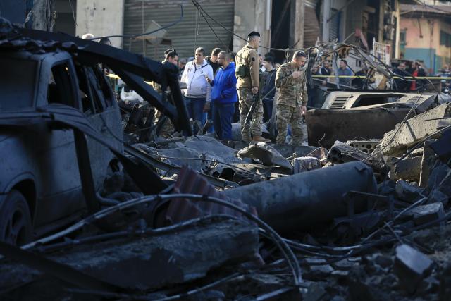 (260106) -- SIDON, Jan. 6, 2026 (Xinhua) -- Soldiers of the Lebanese Army search for survivors in debris after an Israeli airstrike in Sidon, southern Lebanon, Jan. 6, 2026. The Israeli military announced on Monday that it struck Hezbollah and Hamas sites in Lebanon, citing "continued violations of the ceasefire understandings." (Photo by Ali Hashisho/Xinhua)