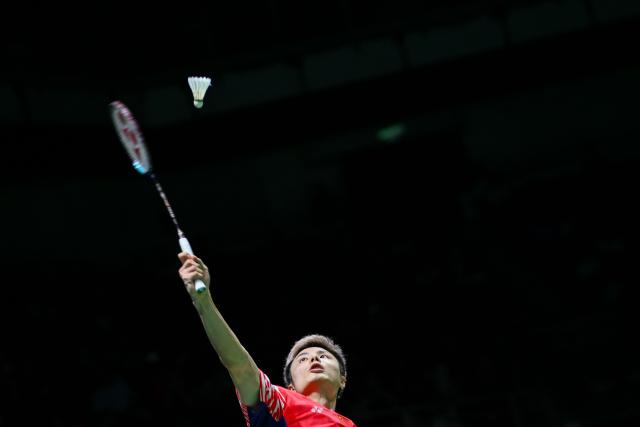 (260106) -- KUALA LUMPUR, Jan. 6, 2026 (Xinhua) -- Shi Yuqi of China hits a return during the men's singles round of 32 match against Rasmus Gemke of Denmark at the Malaysia Open 2026 badminton tournament in Kuala Lumpur, Malaysia, Jan. 6, 2026. (Photo by Chong Voon Chung/Xinhua)