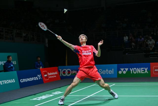 (260106) -- KUALA LUMPUR, Jan. 6, 2026 (Xinhua) -- Shi Yuqi of China hits a return during the men's singles round of 32 match against Rasmus Gemke of Denmark at the Malaysia Open 2026 badminton tournament in Kuala Lumpur, Malaysia, Jan. 6, 2026. (Photo by Chong Voon Chung/Xinhua)