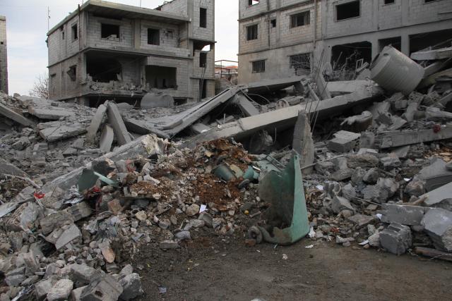 (260106) -- AL-MANARA, Jan. 6, 2026 (Xinhua) -- This photo taken on Jan. 6, 2026 shows destroyed residential buildings after an Israeli airstrike in Al-Manara near Lebanon's eastern border. The Israeli military announced on Monday that it struck Hezbollah and Hamas sites in Lebanon, citing "continued violations of the ceasefire understandings." (Photo by Taher Abu Hamdan/Xinhua)