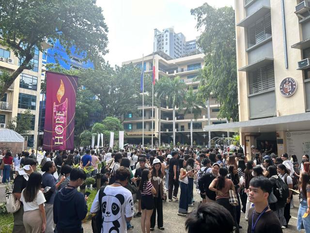 (260107) -- MANILA, Jan. 7, 2026 (Xinhua) -- People gather outside school buildings after a 6.7-magnitude earthquake in Davao Oriental province in the southern Philippines, Jan. 7, 2025. The Philippine Institute of Volcanology and Seismology said a magnitude 6.7 earthquake hit off Davao Oriental province in the southern Philippines on Wednesday morning. (Xinhua)