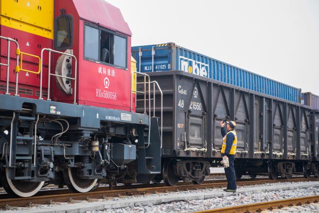 (260107) -- CHONGQING, Jan. 7, 2026 (Xinhua) -- A freight train loaded with Chongqing-manufactured new energy vehicles waits for departure at Yuzui Station of Guoyuan Port in Chongqing, southwest China, Jan. 7, 2026. Departing on Wednesday, this freight train is expected to arrive at Nansha Port in south China's Guangzhou City after 48 hours and then be transferred to a vessel bound for the Middle East.
  As a major vehicle manufacturing base, Chongqing has stably operated eastbound and southbound rail-sea intermodal freight trains via Ningbo, east China's Zhejiang Province and Qinzhou, south China's Guangxi Zhuang Autonomous Region. (Xinhua/Tang Yi)