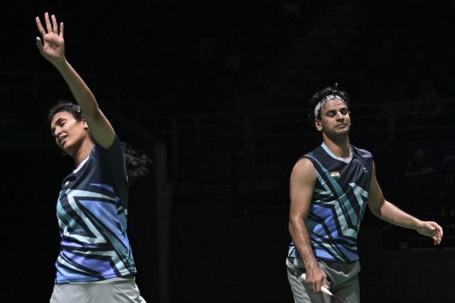 (260107) -- KUALA LUMPUR, Jan. 7, 2026 (Xinhua) -- Rohan Kapoor (R)/Ruthvika Shivani Gadde of India are seen during the mixed doubles round of 32 match against Jiang Zhenbang/Wei Yaxin of China at the Malaysia Open 2026 badminton tournament in Kuala Lumpur, Malaysia, Jan. 7, 2026. (Xinhua/Cheng Yiheng)