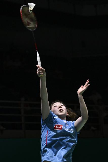 (260107) -- KUALA LUMPUR, Jan. 7, 2026 (Xinhua) -- Gunji Riko competes during the women's singles round of 32 match between Gunji Riko of Japan and Gao Fangjie of China at the Malaysia Open 2026 badminton tournament in Kuala Lumpur, Malaysia, Jan. 7, 2026. (Xinhua/Cheng Yiheng)