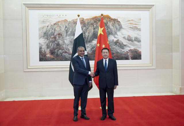 (260107) -- BEIJING, Jan. 7, 2026 (Xinhua) -- Chinese State Councilor and Minister of Public Security Wang Xiaohong meets with Syed Mohsin Raza Naqvi, Pakistan's Minister for Interior and Narcotics Control, in Beijing, capital of China, Jan. 7, 2026. (Xinhua/Cai Yang)