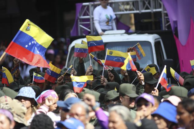 (260107) -- CARACAS, Jan. 7, 2026 (Xinhua) -- People attend a rally in support of President Nicolas Maduro in Caracas, Venezuela, Jan. 6, 2026. (Str/Xinhua)
