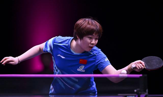 (260108) -- DOHA, Jan. 8, 2026 (Xinhua) -- Kuai Man of China hits a return during the women's singles Round of 32 match against Elizabeta Samara of Romania at the WTT Champions Doha 2026 in Doha, Qatar, on Jan. 7, 2026. (Photo by Nikku/Xinhua)
