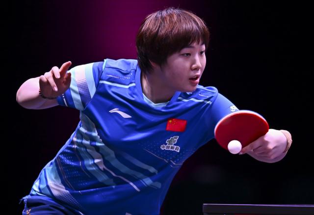 (260108) -- DOHA, Jan. 8, 2026 (Xinhua) -- Kuai Man of China hits a return during the women's singles Round of 32 match against Elizabeta Samara of Romania at the WTT Champions Doha 2026 in Doha, Qatar, on Jan. 7, 2026. (Photo by Nikku/Xinhua)