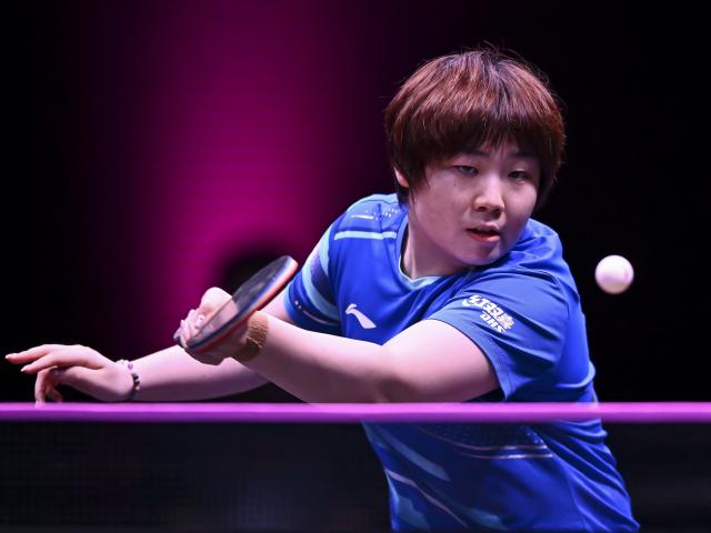 (260108) -- DOHA, Jan. 8, 2026 (Xinhua) -- Kuai Man of China hits a return during the women's singles Round of 32 match against Elizabeta Samara of Romania at the WTT Champions Doha 2026 in Doha, Qatar, on Jan. 7, 2026. (Photo by Nikku/Xinhua)