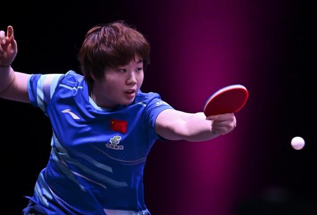(260108) -- DOHA, Jan. 8, 2026 (Xinhua) -- Kuai Man of China hits a return during the women's singles Round of 32 match against Elizabeta Samara of Romania at the WTT Champions Doha 2026 in Doha, Qatar, on Jan. 7, 2026. (Photo by Nikku/Xinhua)