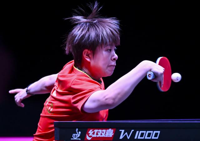 (260108) -- DOHA, Jan. 8, 2026 (Xinhua) -- Wang Yidi of China hits a return during the women's singles Round of 32 match against Cheng I-Ching of Chinese Taipei at the WTT Champions Doha 2026 in Doha, Qatar, on Jan. 7, 2026. (Photo by Nikku/Xinhua)