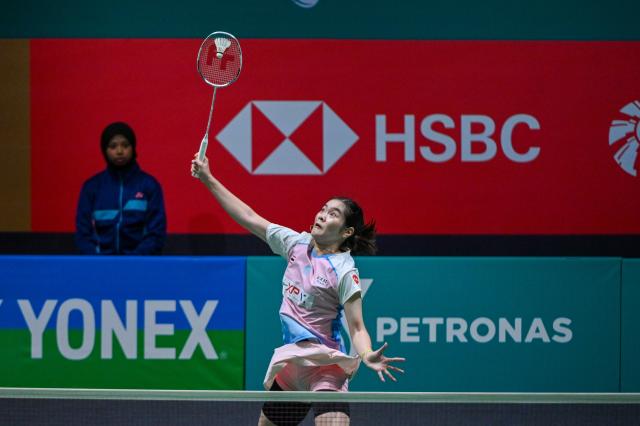 (260108) -- KUALA LUMPUR, Jan. 8, 2026 (Xinhua) - Busanan Ongbamrungphan of Thailand hits a return during the women's singles round of 16 match against Chen Yufei of China at the Malaysia Open 2026 badminton tournament in Kuala Lumpur, Malaysia, Jan. 8, 2026. (Photo by Chong Voon Chung/Xinhua)