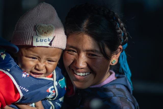 (260108) -- TINGRI, Jan. 8, 2026 (Xinhua) -- Cering Lhaba and his mother are pictured at home in a village of Chamco Township, Tingri County of Xigaze City, southwest China's Xizang Autonomous Region, on Jan. 5, 2026.
  A 6.8-magnitude earthquake struck Tingri County in the city of Xigaze on Jan. 7, 2025, leveling thousands of houses. The day after the earthquake, Cering Lhaba was born in a hospital in Xigaze.
  After being discharged from the hospital, the boy from quake-affected Tingri became the beloved baby of the residents living in the temporary prefabricated houses. When his parents had no time to take care of him, neighbors, village cadres and local officials all became his temporary babysitters.
  Cering Lhaba, who has just spent his first birthday, has grown up healthily, and lives a pleasant life in his spacious and bright new home. (Xinhua/Jiang Fan)