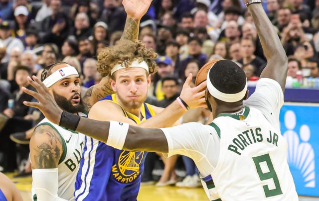 (260108) -- SAN FRANCISCO, Jan. 8, 2026 (Xinhua) -- Golden State Warriors' Brandin Podziemski (C) drives to the basket during the 2025-2026 NBA regular season basketball game between Golden State Warriors and Milwaukee Bucks in San Francisco, the United States, Jan. 7, 2026. (Photo by Arthur Dong/Xinhua)