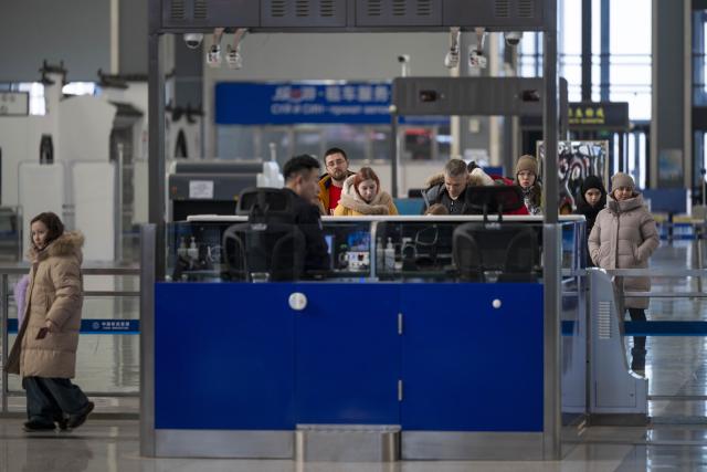 (260108) -- HARBIN, Jan. 8, 2026 (Xinhua) -- Inbound passengers queue for information inspection at a joint inspection hall of the Suifenhe highway port, in Suifenhe City, northeast China's Heilongjiang Province, on Jan. 8, 2026.
  China announced on Sept. 2, 2025 a one-year trial of a 30-day visa-free policy for Russian nationals holding ordinary passports, which took effect on Sept. 15, 2025, while Russian President Vladimir Putin signed a decree on Dec. 1, 2025 allowing Chinese nationals to enter Russia visa-free for tourism or business purposes for a period not exceeding 30 days until Sept. 14, 2026. 
  Upon the mutual visa exemption implementation, cross-border tourism has thrived between China and Russia. Statistics show that from Jan. 1 to Jan. 7 of 2026, the number of foreign tourists entering and leaving Suifenhe port reached 10,007, registering an increase of 83 percent year on year. (Xinhua/Zhang Tao)