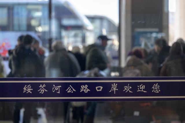 (260108) -- HARBIN, Jan. 8, 2026 (Xinhua) -- Passengers prepare to board the buses at a joint inspection hall of the Suifenhe highway port, in Suifenhe City, northeast China's Heilongjiang Province, on Jan. 8, 2026.
  China announced on Sept. 2, 2025 a one-year trial of a 30-day visa-free policy for Russian nationals holding ordinary passports, which took effect on Sept. 15, 2025, while Russian President Vladimir Putin signed a decree on Dec. 1, 2025 allowing Chinese nationals to enter Russia visa-free for tourism or business purposes for a period not exceeding 30 days until Sept. 14, 2026. 
  Upon the mutual visa exemption implementation, cross-border tourism has thrived between China and Russia. Statistics show that from Jan. 1 to Jan. 7 of 2026, the number of foreign tourists entering and leaving Suifenhe port reached 10,007, registering an increase of 83 percent year on year. (Xinhua/Zhang Tao)