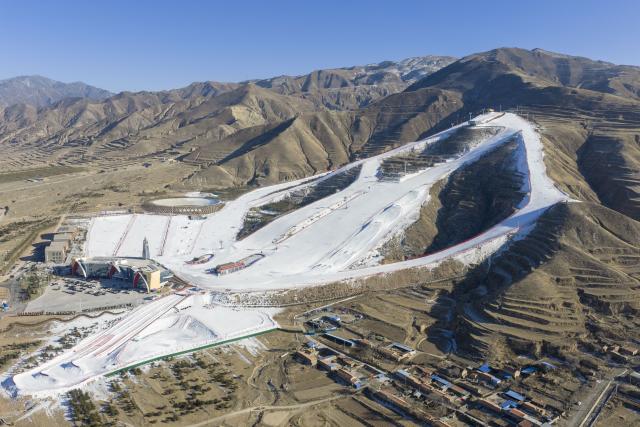 (260108) -- SHUOZHOU, Jan. 8, 2026 (Xinhua) -- An aerial drone photo taken on Jan. 8, 2026 shows a panoramic view of the Guangwu international ski resort in Shanyin County of Shuozhou, north China's Shanxi Province. Shanyin County has been leveraging its geographical advantage to develop ice and snow-themed tourism, which is now a new driver for the local economy. (Xinhua/Yang Chenguang)