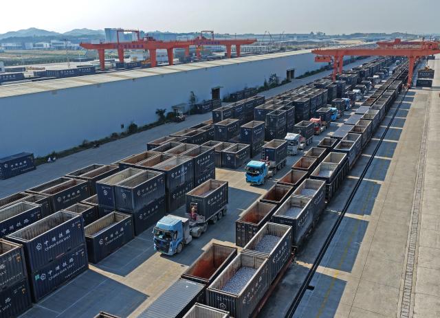 (260108) -- NANNING, Jan. 8, 2026 (Xinhua) -- A drone photo taken on Jan. 8, 2026 shows the Nanning International Railway Port in Nanning, south China's Guangxi Zhuang Autonomous Region. China's New International Land-Sea Trade Corridor rail service handled a record 1.425 million twenty-foot equivalent units (TEUs) of cargo in 2025, marking a 47.6 percent increase and surpassing the one-million-TEU milestone for the first time, China Railway Nanning Group said on Tuesday. (Xinhua/Zhou Hua)