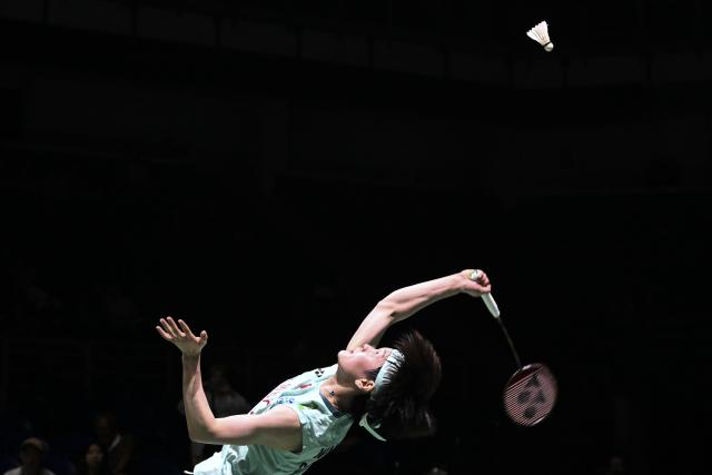 (260108) -- KUALA LUMPUR, Jan. 8, 2026 (Xinhua) -- Wang Zhiyi of China hits a return during the women's singles round of 16 match against Lin Hsiang Ti of Chinese Taipei at the Malaysia Open 2026 badminton tournament in Kuala Lumpur, Malaysia, Jan. 8, 2026. (Xinhua/Cheng Yiheng)