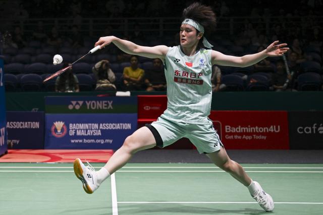 (260108) -- KUALA LUMPUR, Jan. 8, 2026 (Xinhua) -- Wang Zhiyi of China hits a return during the women's singles round of 16 match against Lin Hsiang Ti of Chinese Taipei at the Malaysia Open 2026 badminton tournament in Kuala Lumpur, Malaysia, Jan. 8, 2026. (Xinhua/Cheng Yiheng)