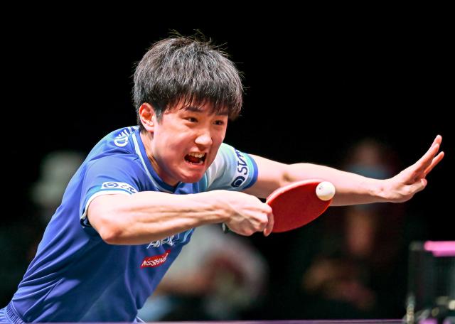 (260109) -- DOHA, Jan. 9, 2026 (Xinhua) -- Tomokazu Harimoto of Japan hits a return during the men's singles Round of 32 match against Xiang Peng of China at the WTT Champions Doha 2026 in Doha, Qatar, on Jan. 8, 2026. (Photo by Nikku/Xinhua)