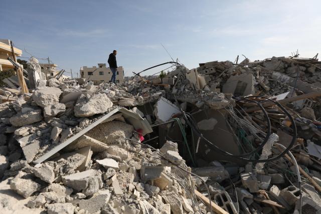 (260109) -- NABLUS, Jan. 9, 2026 (Xinhua) -- A Palestinian walks among the rubble after a house was demolished by Israeli forces in the Upper Ta'awun area of Nablus in the West Bank on Jan. 8, 2026. (Photo by Nidal Eshtayeh/Xinhua)