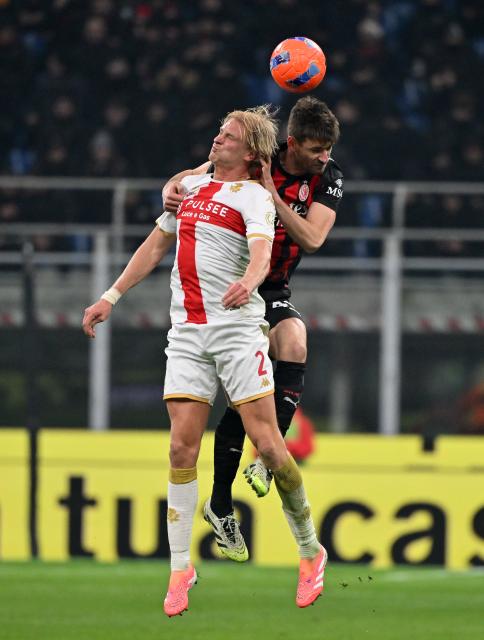 (260109) -- MILAN, Jan. 9, 2026 (Xinhua) -- AC Milan's Matteo Gabbia (R) vies with Genoa's Morten Thorsby during a Serie A football match between AC Milan and Genoa in Milan, Italy, Jan.8, 2026. (Photo by Alberto Lingria/Xinhua)